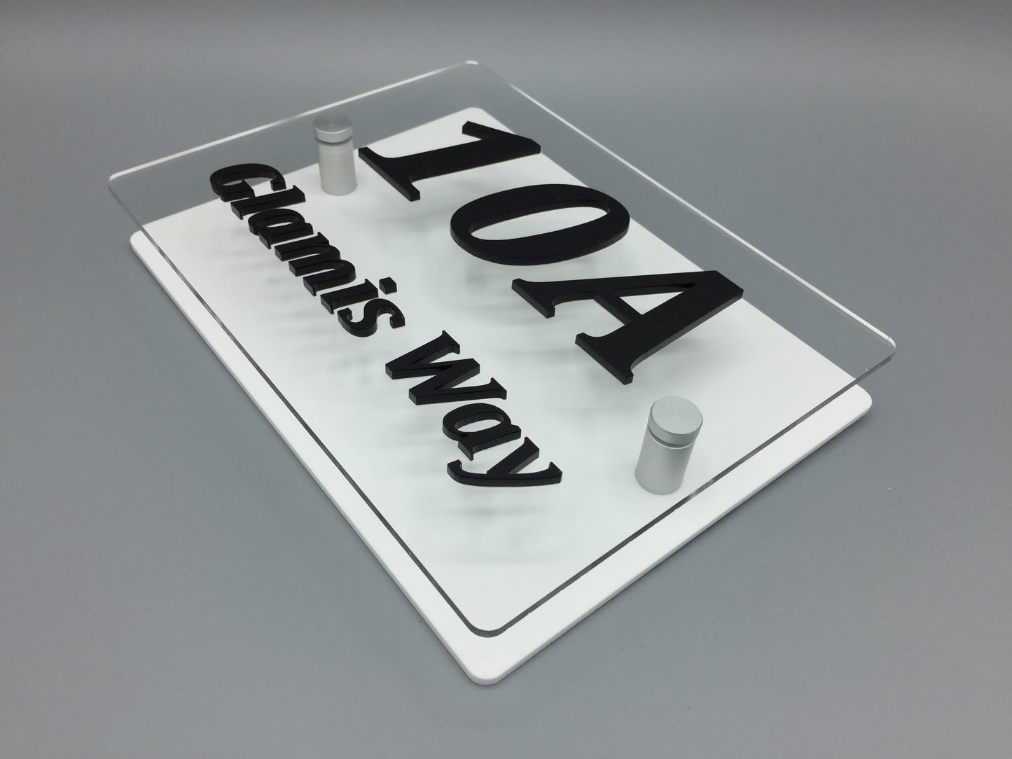 House sign - Acrylic 2D lettering - Black lettering on white background