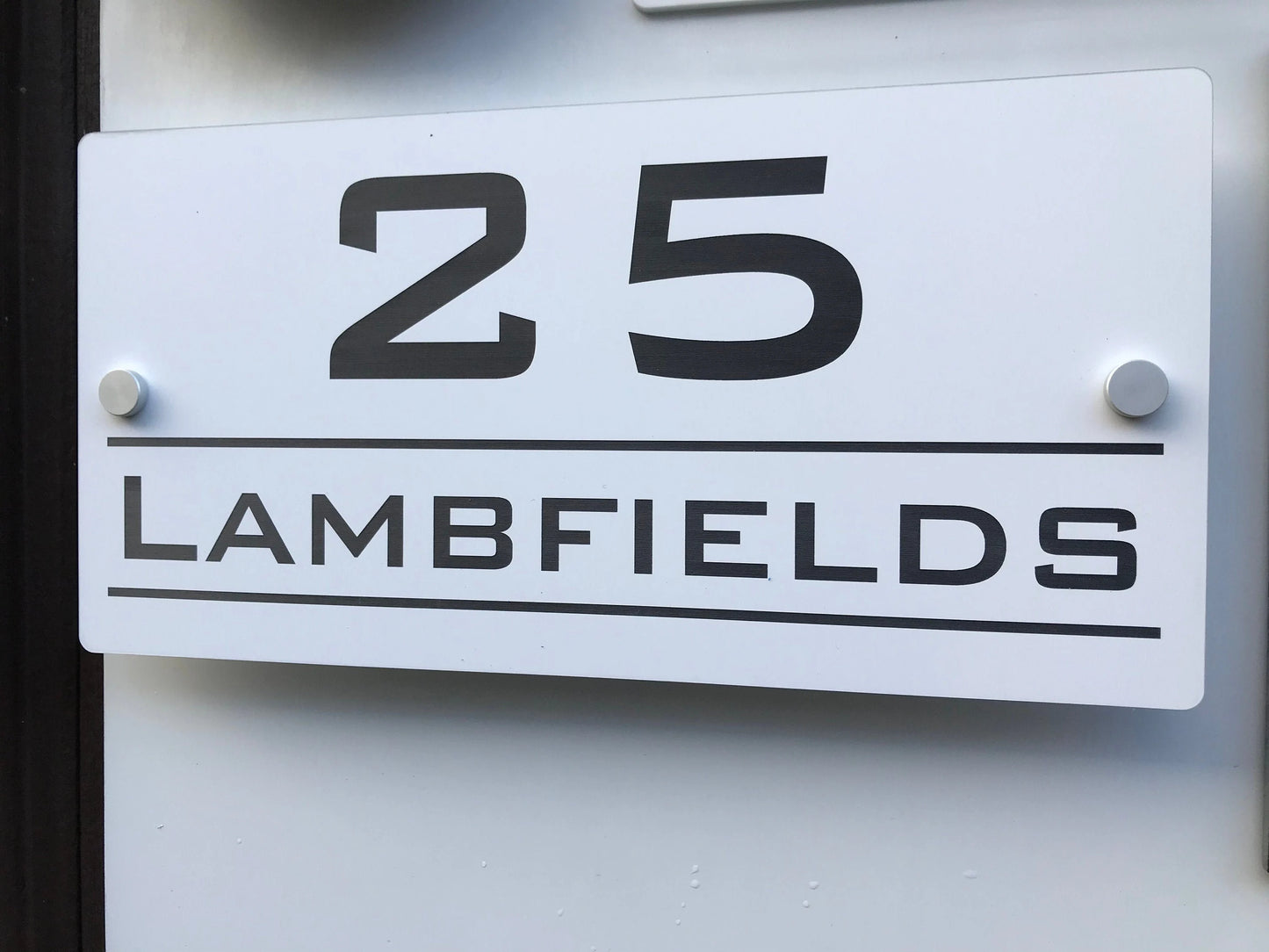 House sign - Acrylic Laminate - Black lettering on white background